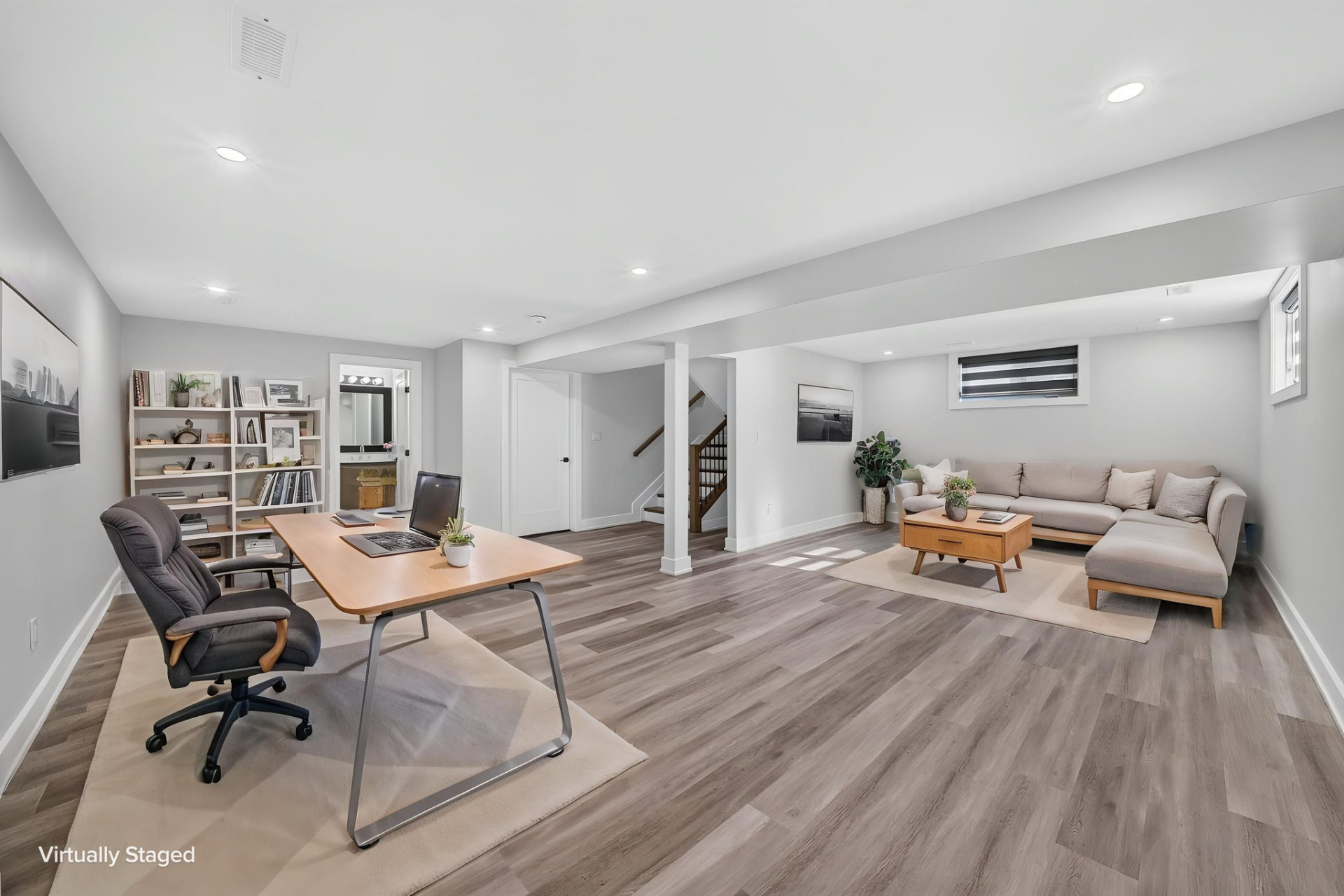 Lower-level recreation room, virtually staged